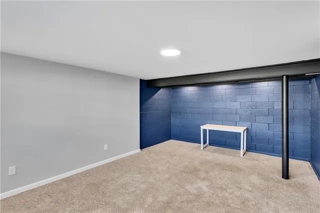 a view of a big room with a bench