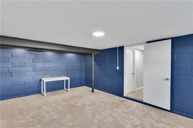 a big room with a wooden cabinets