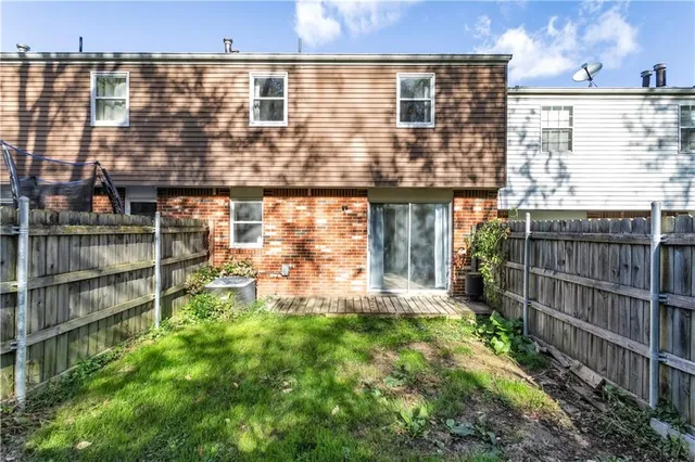 a view of a large building with a yard