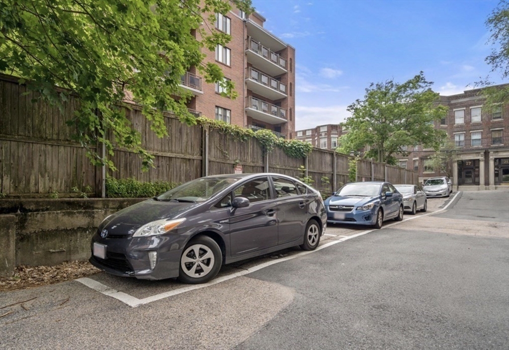 20 Stearns Road, Unit 45 Brookline, MA 02446 - Photo 19 of 22 a view of a car parked in front of a building