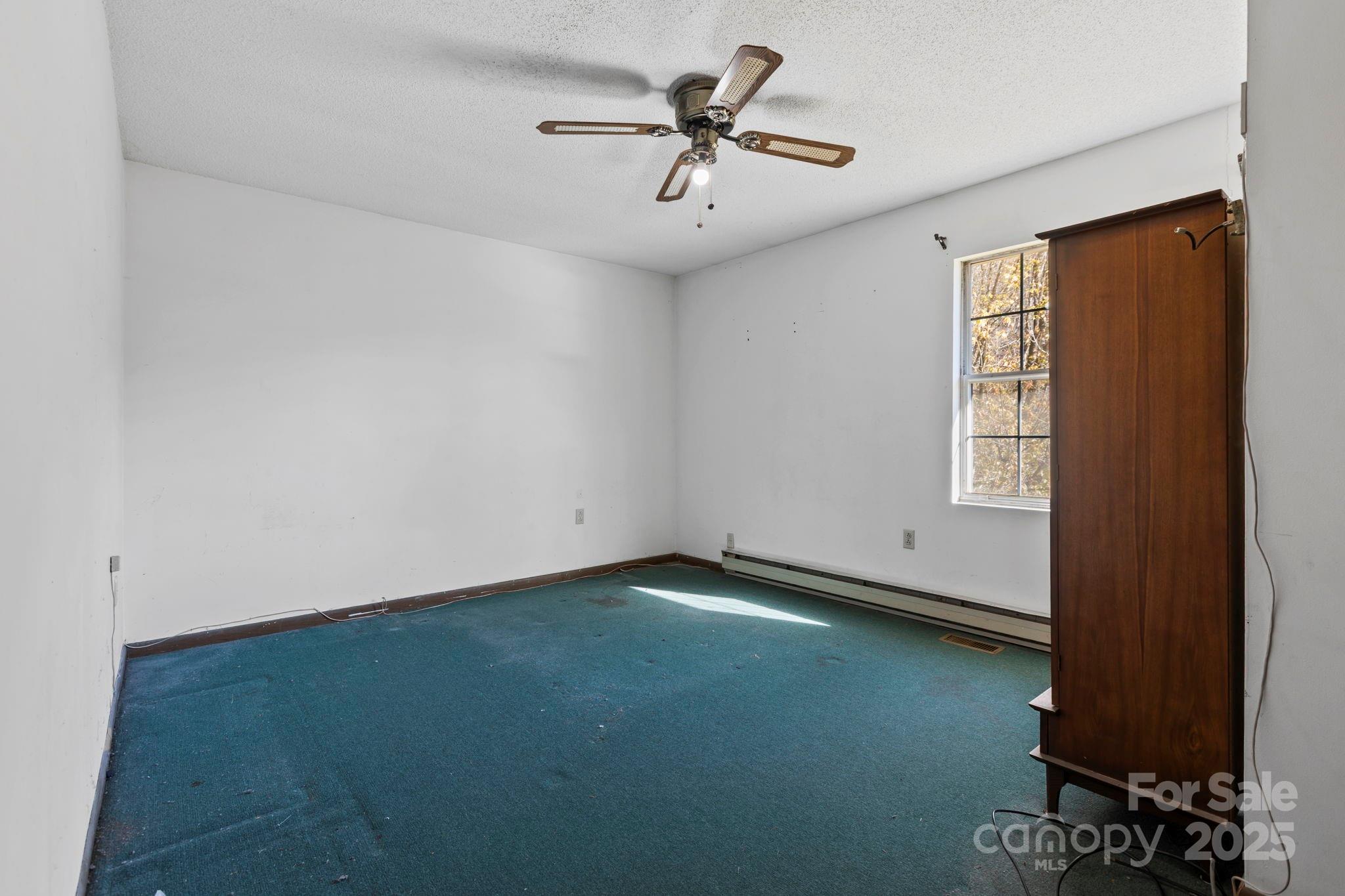 150 Trent Road Brevard, NC 28712 - Photo 11 of 22 a view of an empty room with a window