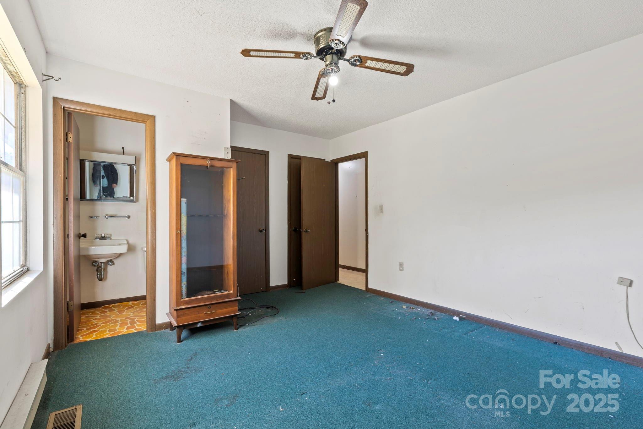 150 Trent Road Brevard, NC 28712 - Photo 12 of 22 a view of empty room with ceiling fan