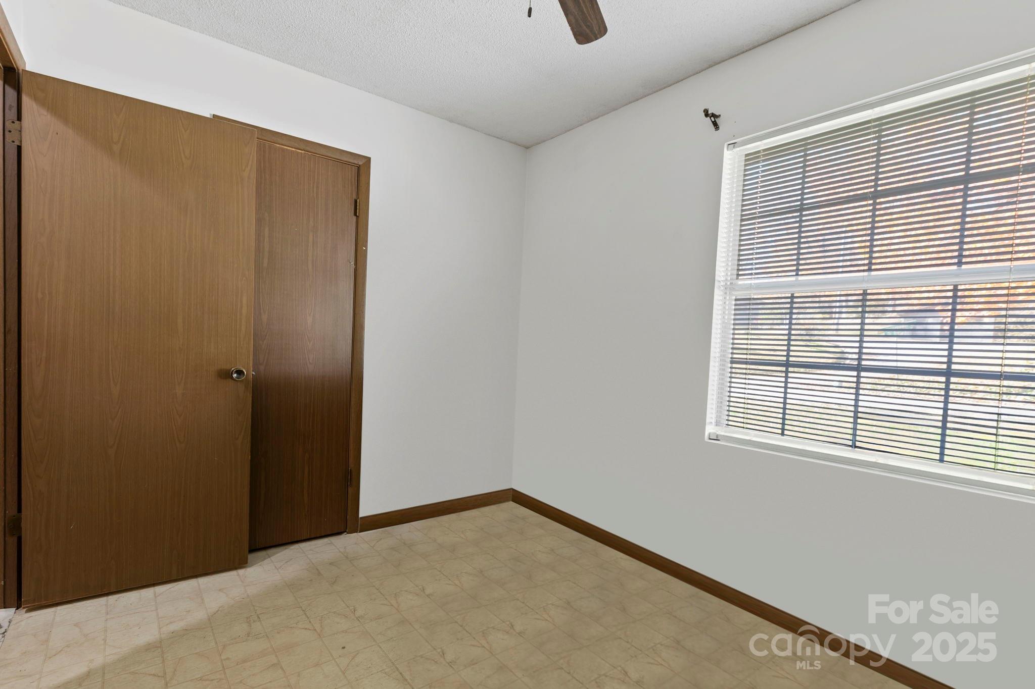 150 Trent Road Brevard, NC 28712 - Photo 21 of 22 a view of an empty room with a window