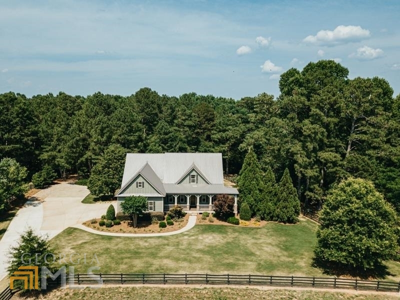 2081 Hester Town Road Madison, GA 30650 - Photo 1 of 1 a view of a house with a yard