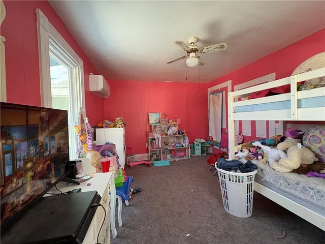 a living room with lots of furniture and decor