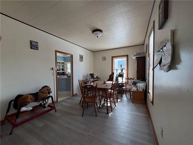 a view of a livingroom with furniture and a couch