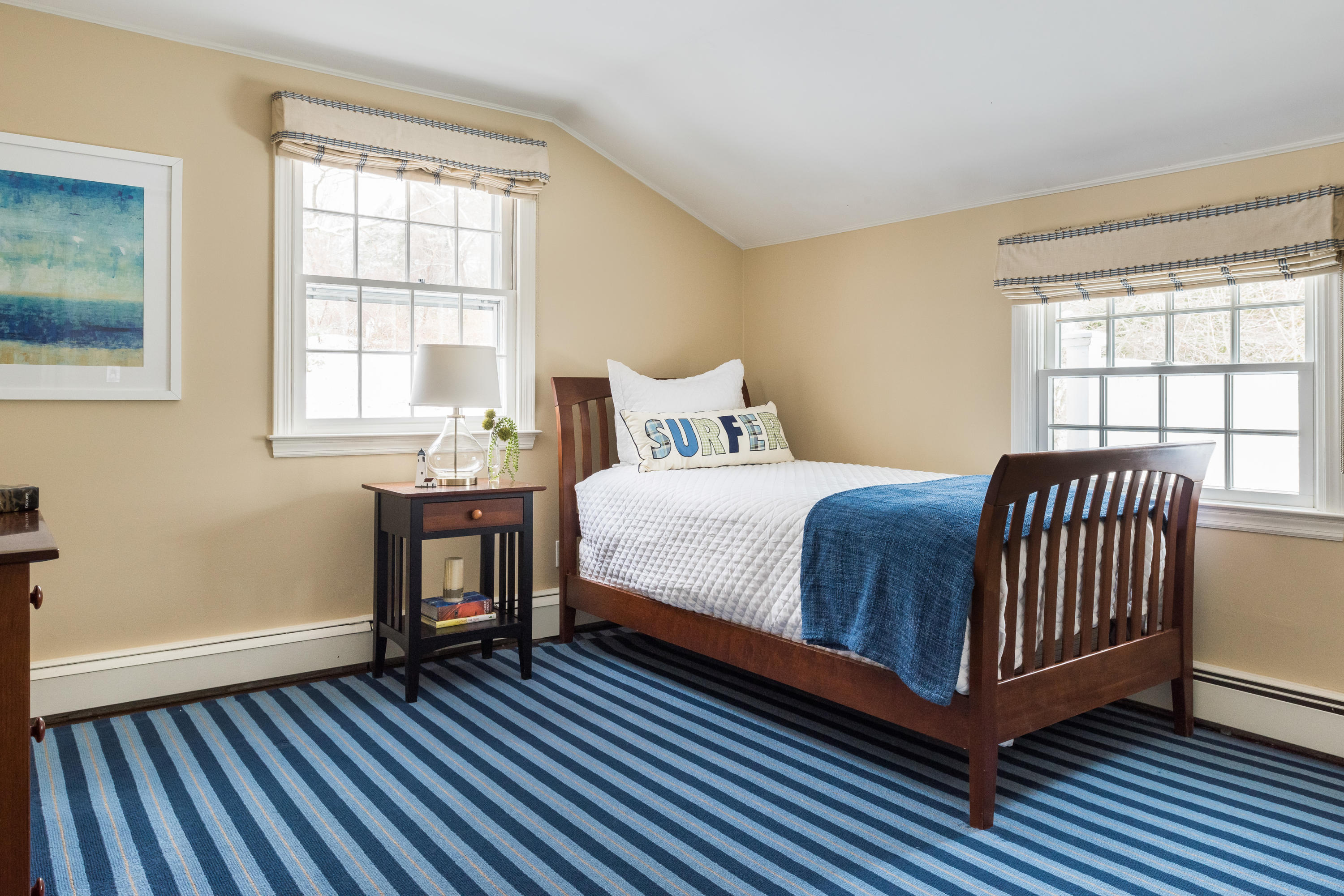 55 Maywood Road Darien, CT 06820 - Photo 19 of 23 a bedroom with a bed and wooden floor