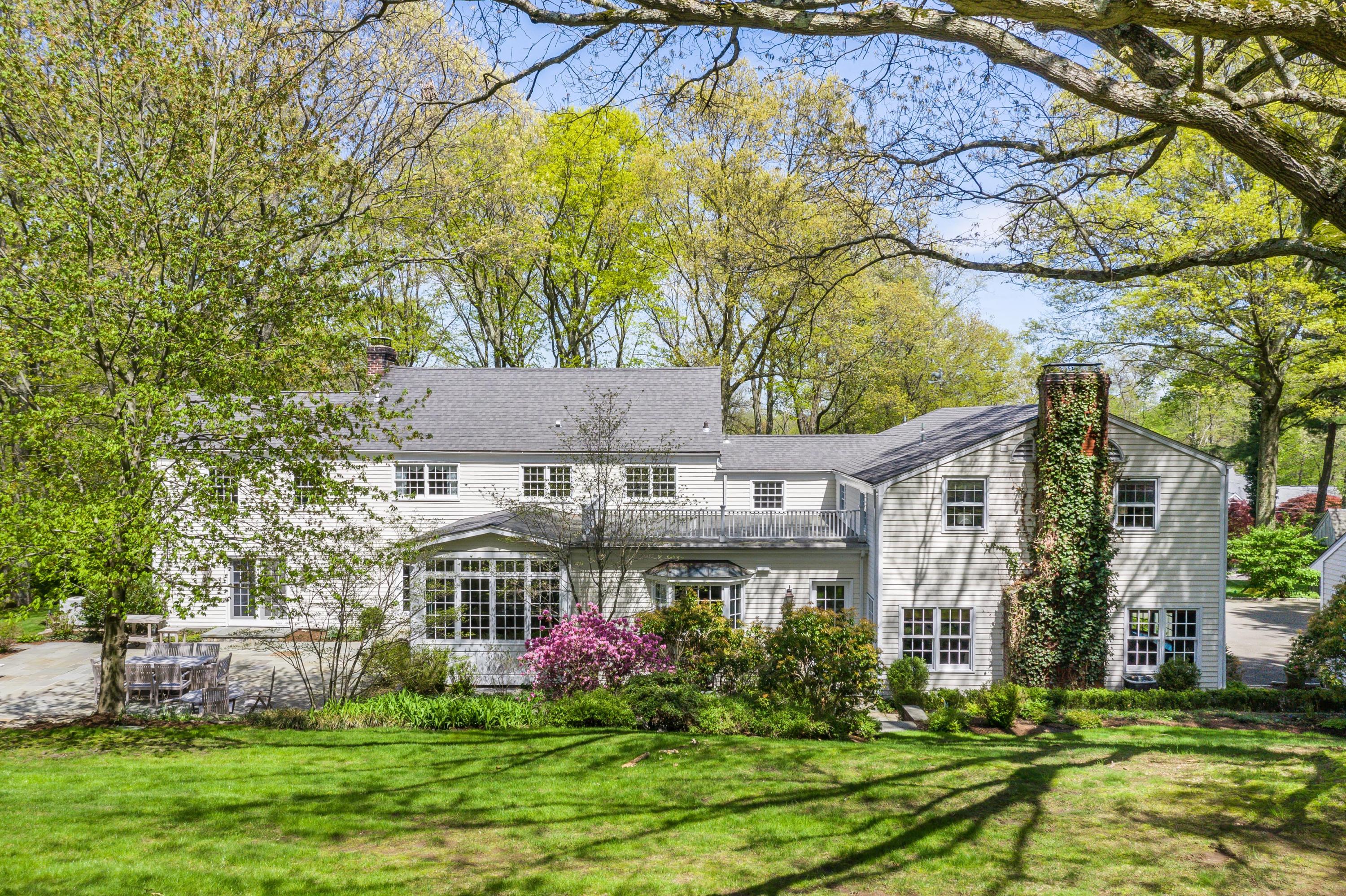 55 Maywood Road Darien, CT 06820 - Photo 22 of 23 a front view of house with yard