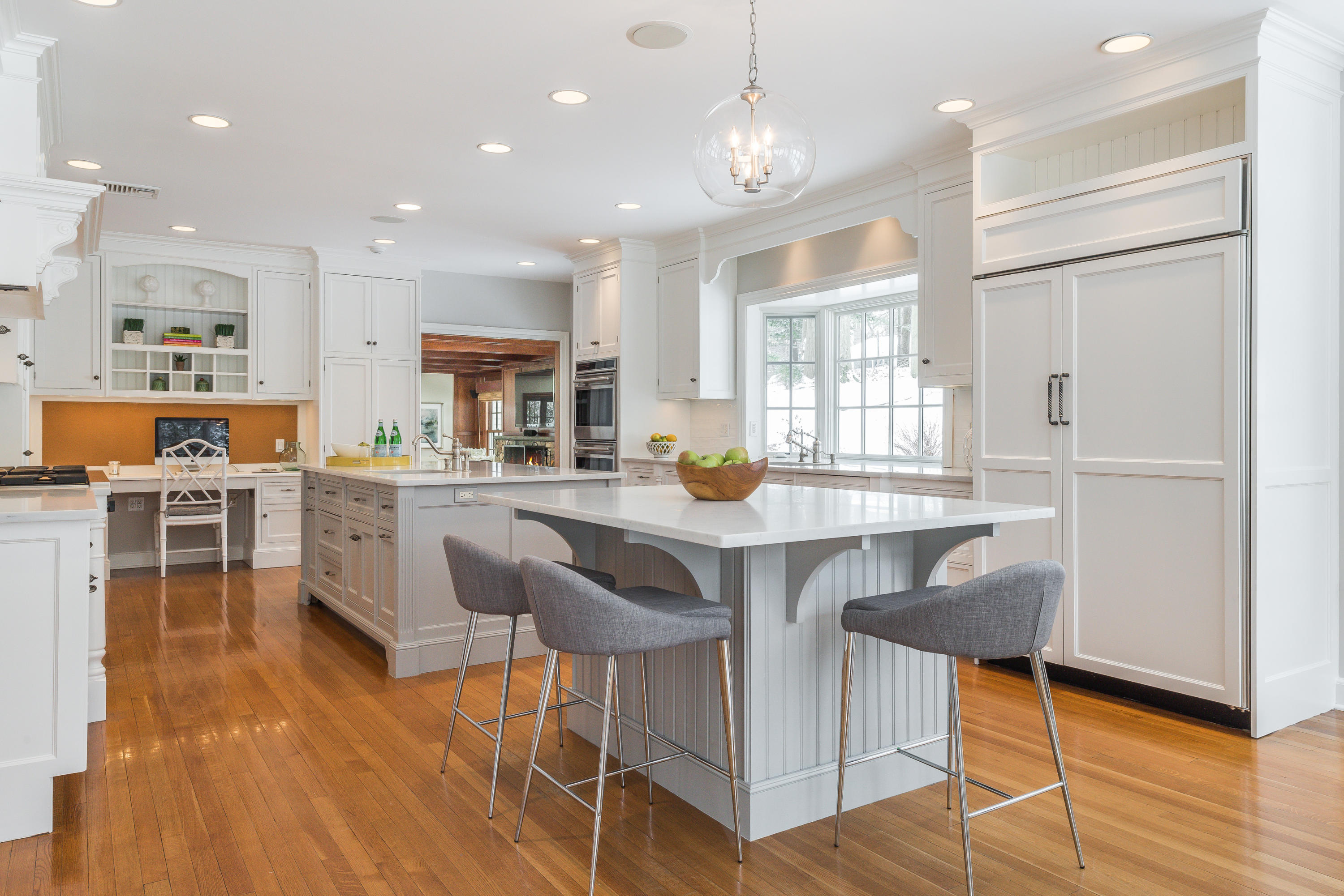 55 Maywood Road Darien, CT 06820 - Photo 4 of 23 a kitchen with stainless steel appliances granite countertop a stove top oven a sink dishwasher and white cabinets with wooden floor
