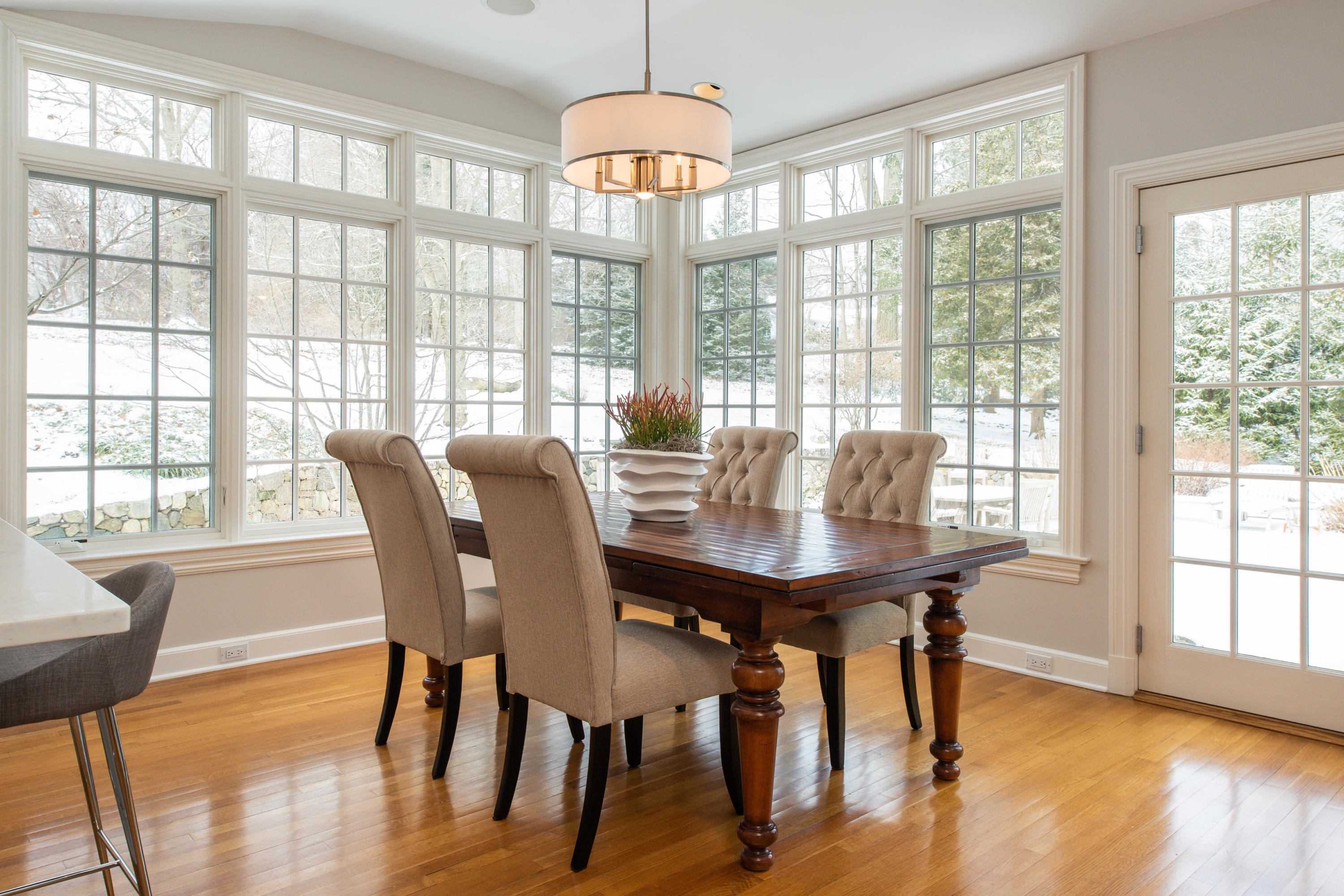 55 Maywood Road Darien, CT 06820 - Photo 5 of 23 a view of a dining room with furniture window and wooden floor