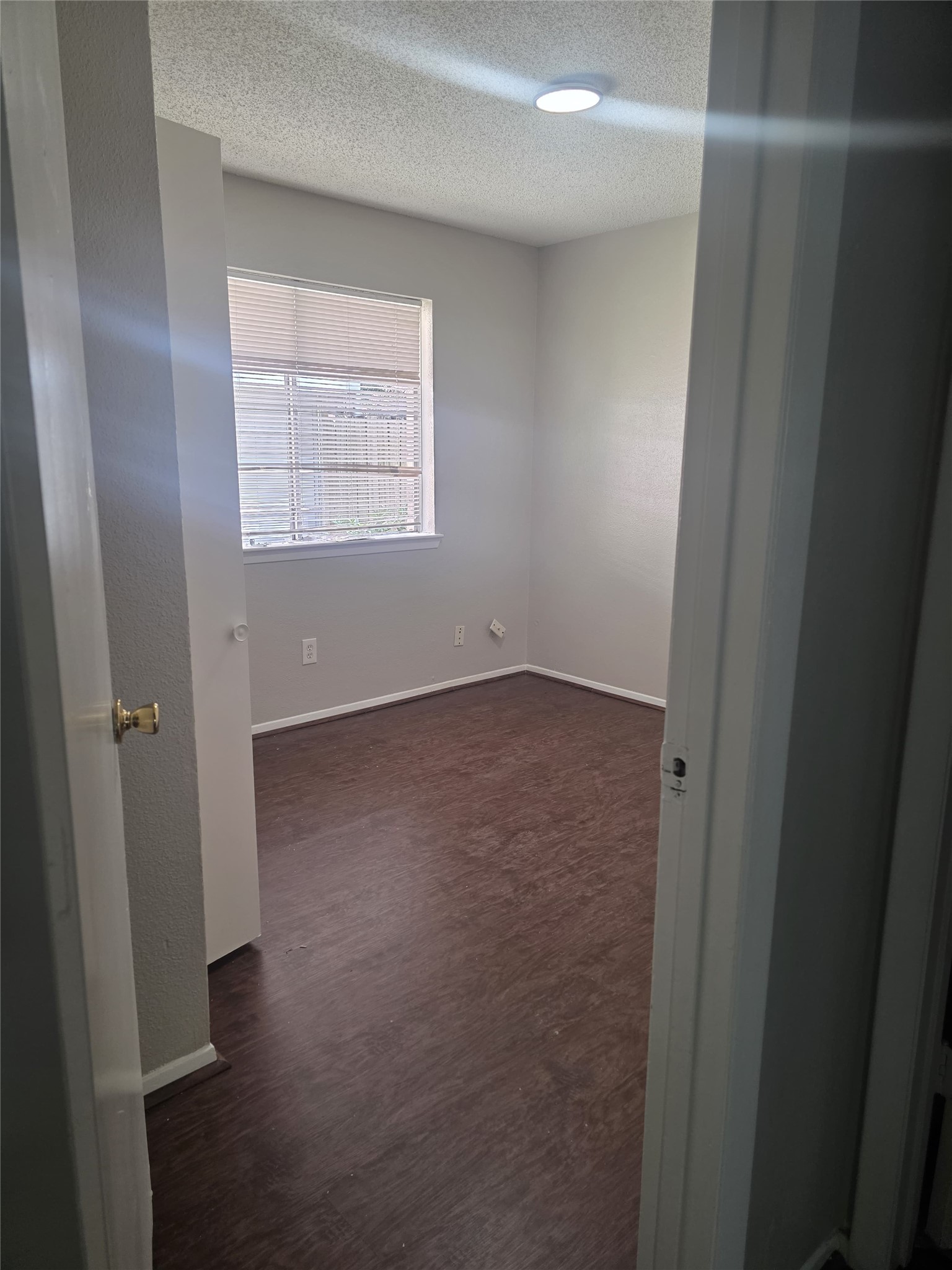 23322 Dew Wood Lane Spring, TX 77373 - Photo 14 of 20 an empty room with windows