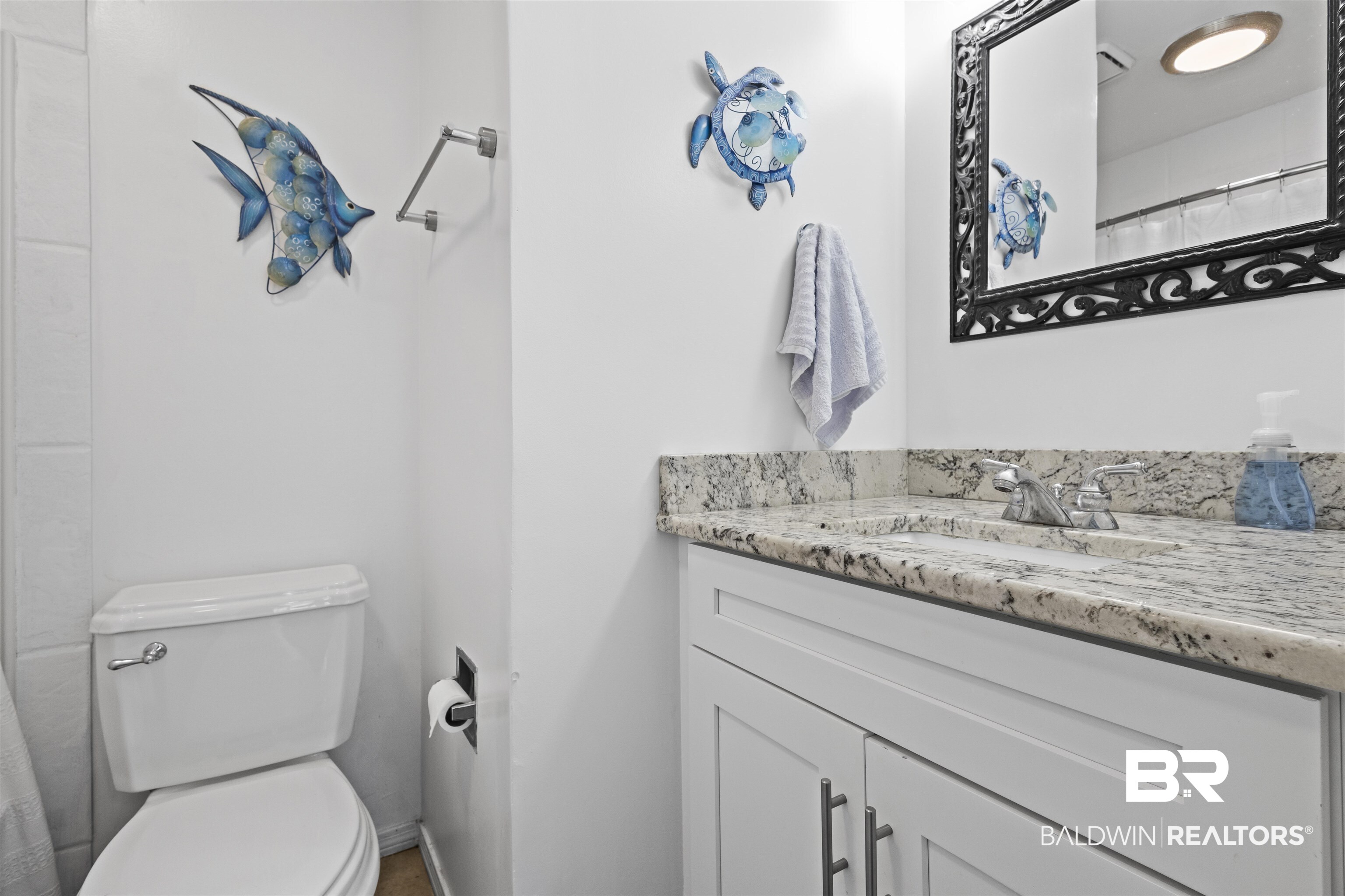 25925 Canal Road, Unit 207 Orange Beach, AL 36561 - Photo 28 of 42 Bathroom with large vanity and toilet