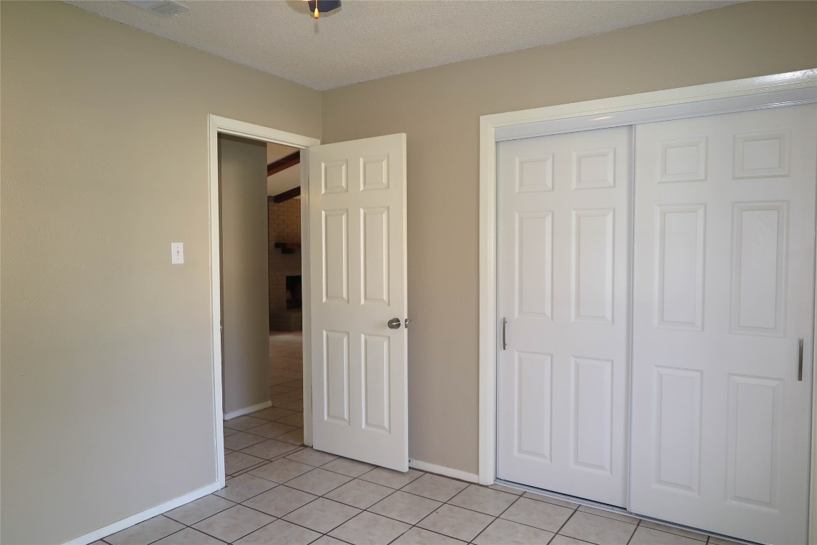 308 Golden Oaks Drive Georgetown, TX 78628 - Photo 12 of 25 an empty room with windows