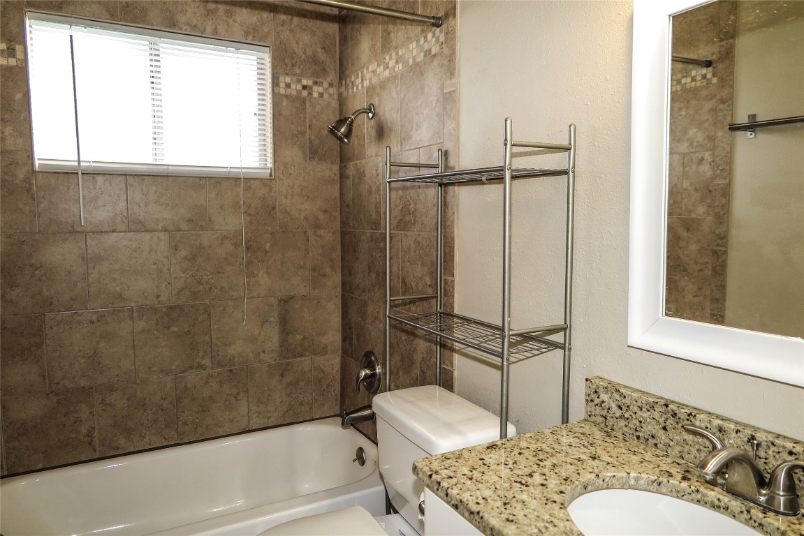 308 Golden Oaks Drive Georgetown, TX 78628 - Photo 13 of 25 a bathroom with a sink toilet and shower