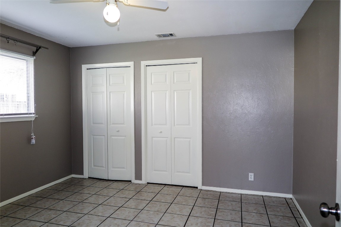 308 Golden Oaks Drive Georgetown, TX 78628 - Photo 16 of 25 a view of an empty room and window