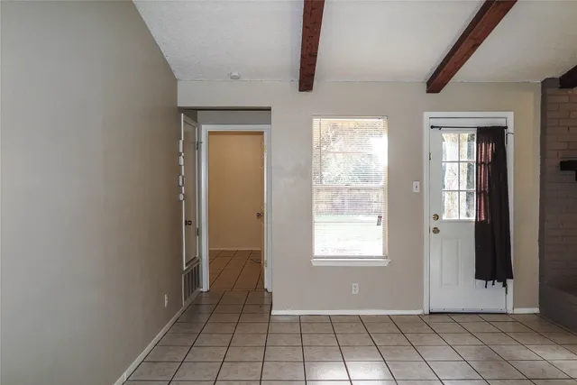 a view of an empty room with window