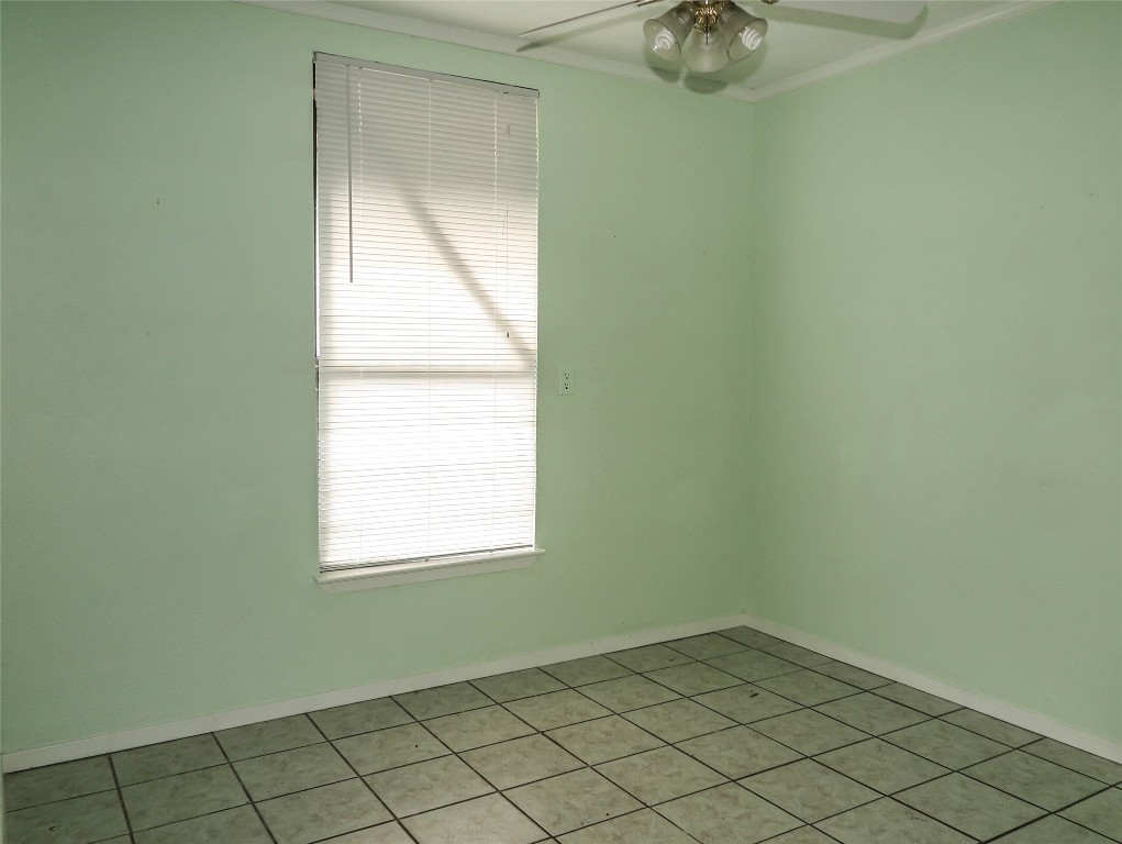 308 Golden Oaks Drive Georgetown, TX 78628 - Photo 25 of 25 an empty room with a window
