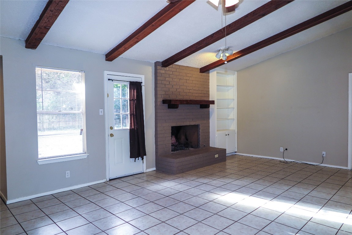 308 Golden Oaks Drive Georgetown, TX 78628 - Photo 9 of 25 an empty room with windows