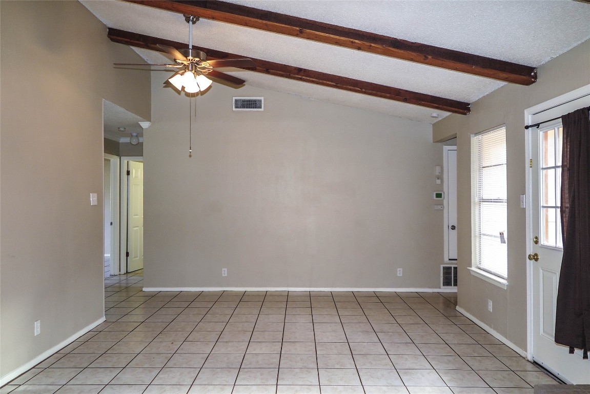 308 Golden Oaks Drive Georgetown, TX 78628 - Photo 10 of 25 a view of an empty room with window and chandelier fan