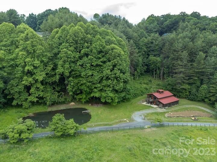 a view of a lake with a yard