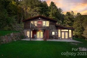 72 Scotchmans Road Waynesville, NC 28786 - Photo 2 of 46 a front view of a house with a yard