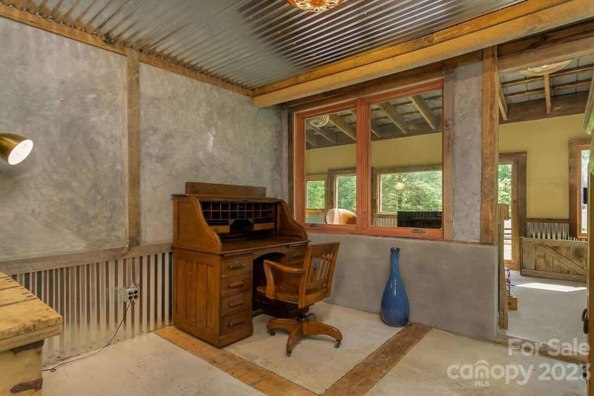 72 Scotchmans Road Waynesville, NC 28786 - Photo 25 of 46 a view of a workspace with furniture