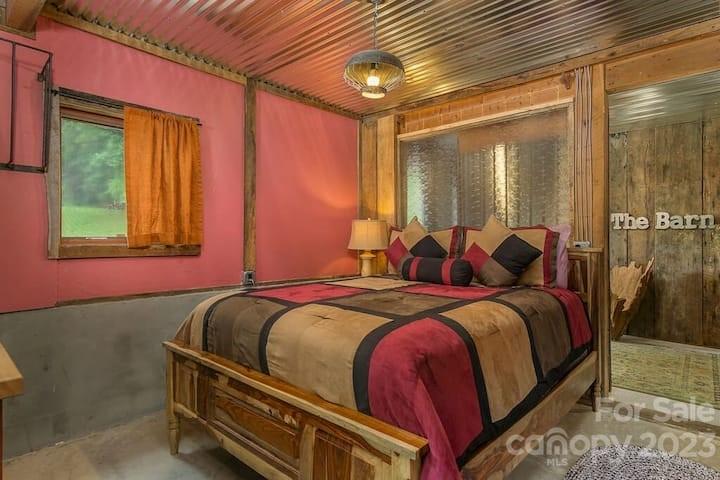 72 Scotchmans Road Waynesville, NC 28786 - Photo 33 of 46 a bed room with a bed and a window