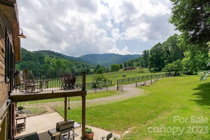 72 Scotchmans Road Waynesville, NC 28786 - Photo 6 of 46 a view of a swimming pool with a patio