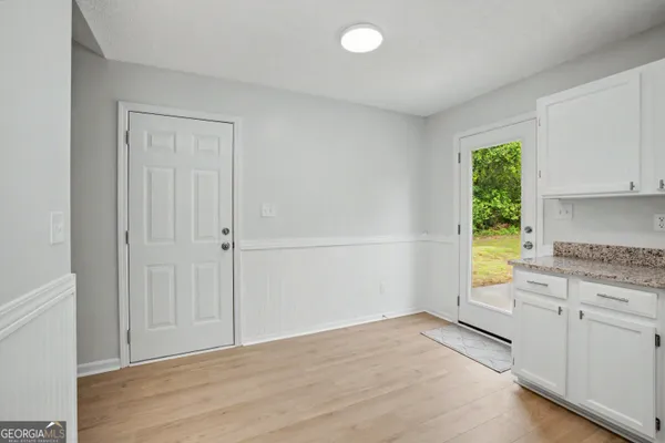 a bathroom with a sink toilet tub and shower