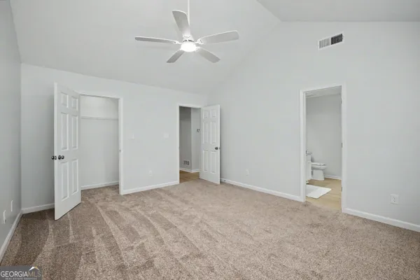 an empty room with windows