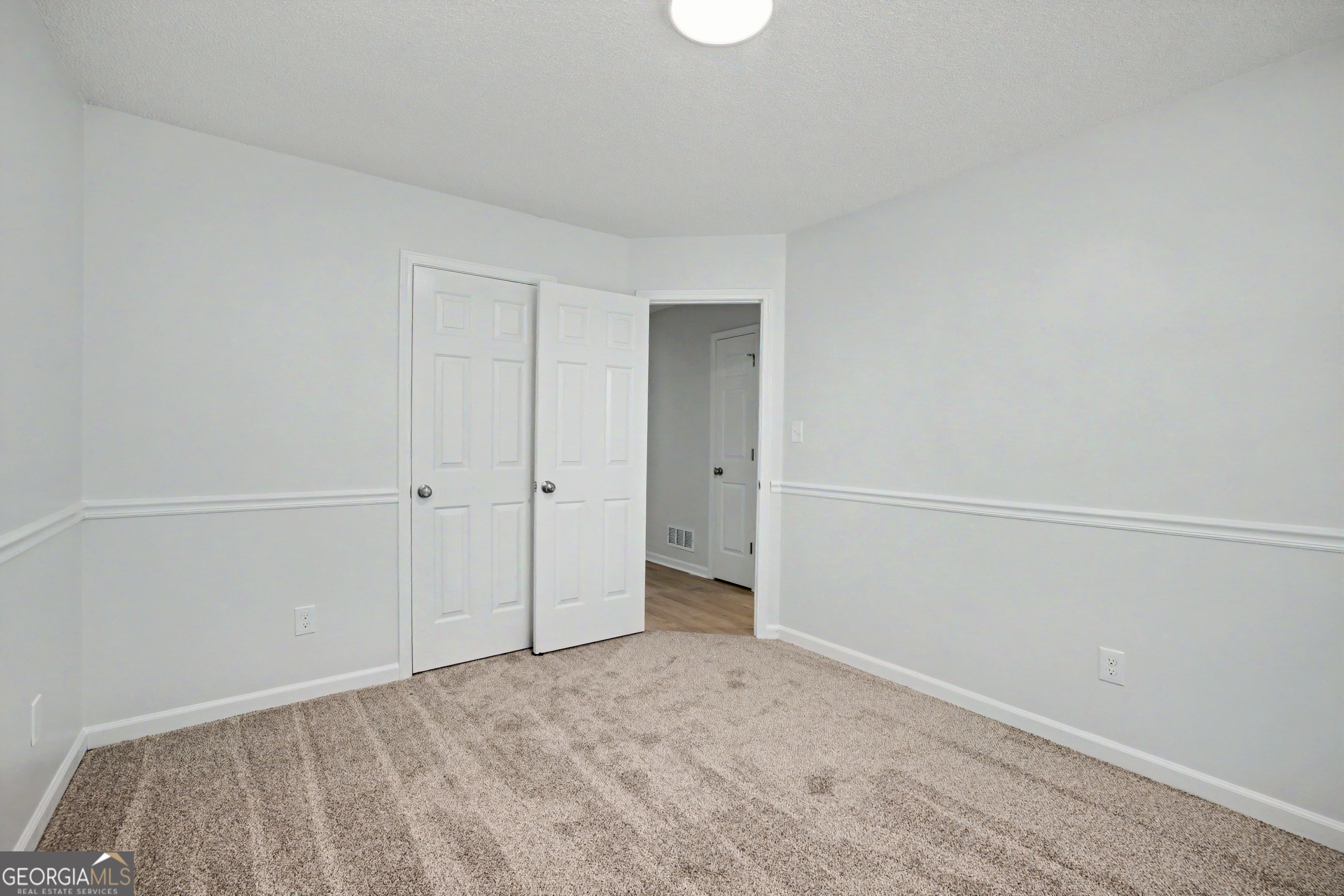 613 Coan Drive Locust Grove, GA 30248 - Photo 26 of 34 a view of an empty room