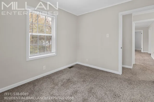 an empty room with a window