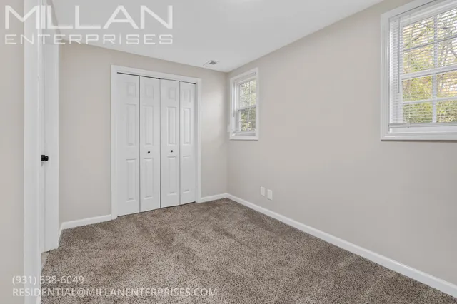 an empty room with windows