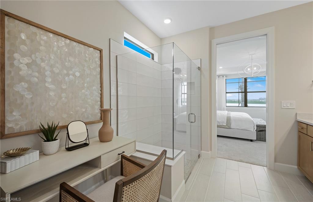 20322 Napa Loop Estero, FL 33928 - Photo 34 of 46 a bedroom with a bed and a window