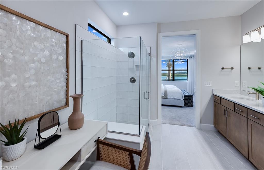 20322 Napa Loop Estero, FL 33928 - Photo 9 of 46 a spacious bathroom with a tub and a sink