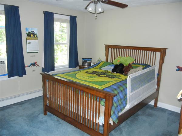 81 Clark Road Sturbridge, MA 01518 - Photo 13 of 21 a bedroom with a bed and a window
