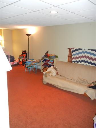 81 Clark Road Sturbridge, MA 01518 - Photo 16 of 21 a living room with furniture and floor to ceiling window