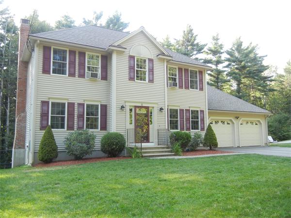 81 Clark Road Sturbridge, MA 01518 - Photo 2 of 21 a front view of a house with a yard