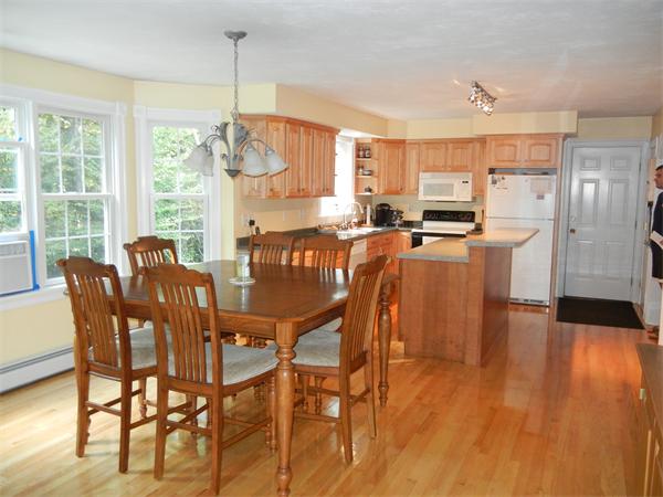 81 Clark Road Sturbridge, MA 01518 - Photo 4 of 21 a view of a dining room with furniture window and wooden floor