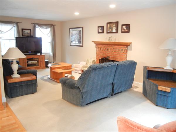 81 Clark Road Sturbridge, MA 01518 - Photo 5 of 21 a living room with furniture and a flat screen tv