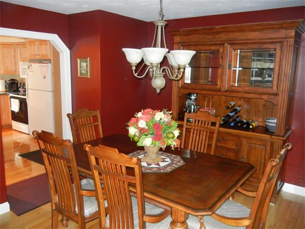 81 Clark Road Sturbridge, MA 01518 - Photo 7 of 21 a view of a dining room with furniture and chandelier