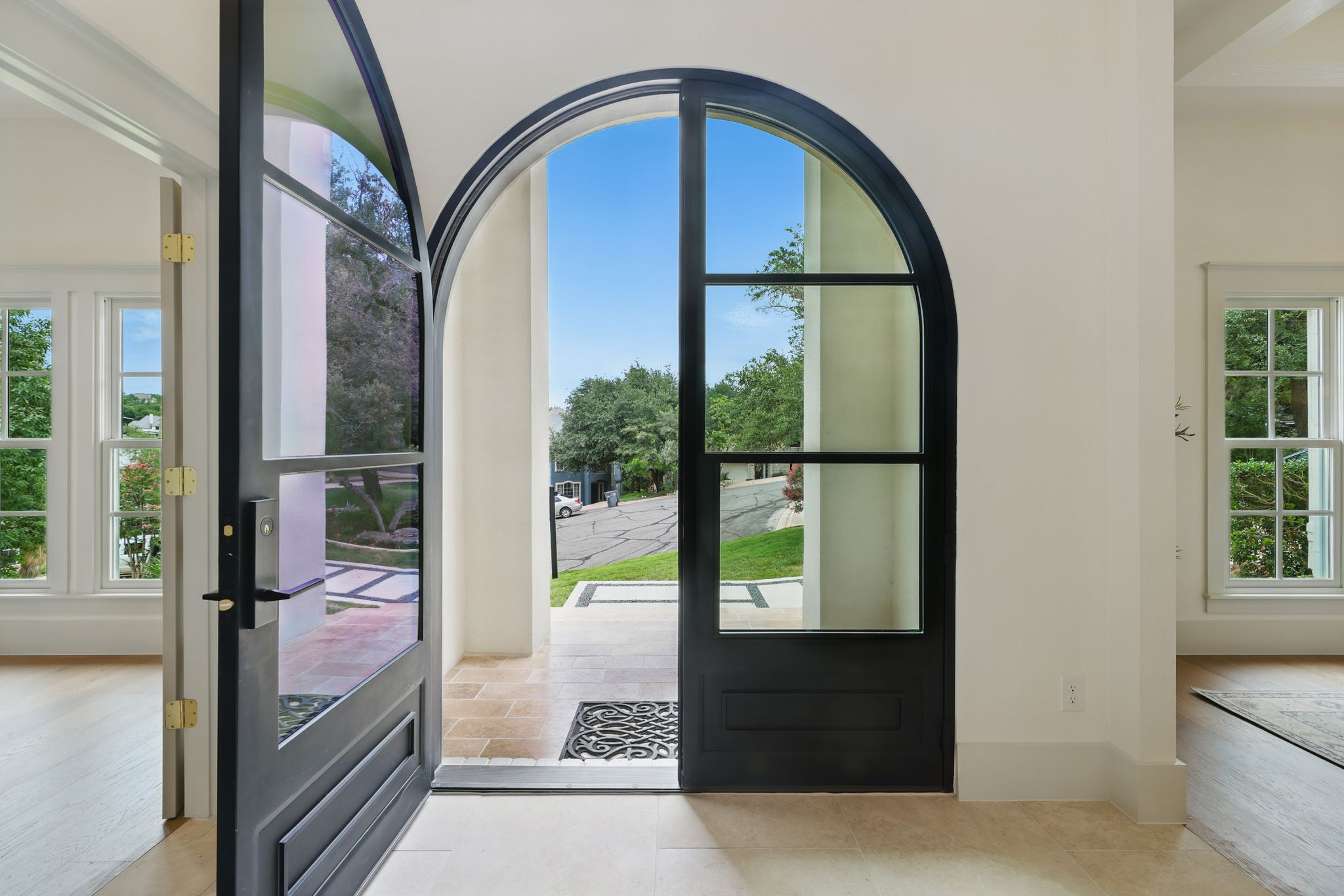 6905 Rudi Cove Austin, TX 78759 - Photo 5 of 36 a view of an entryway with a floor to ceiling window