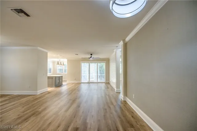 a view of livingroom and hardwood floor