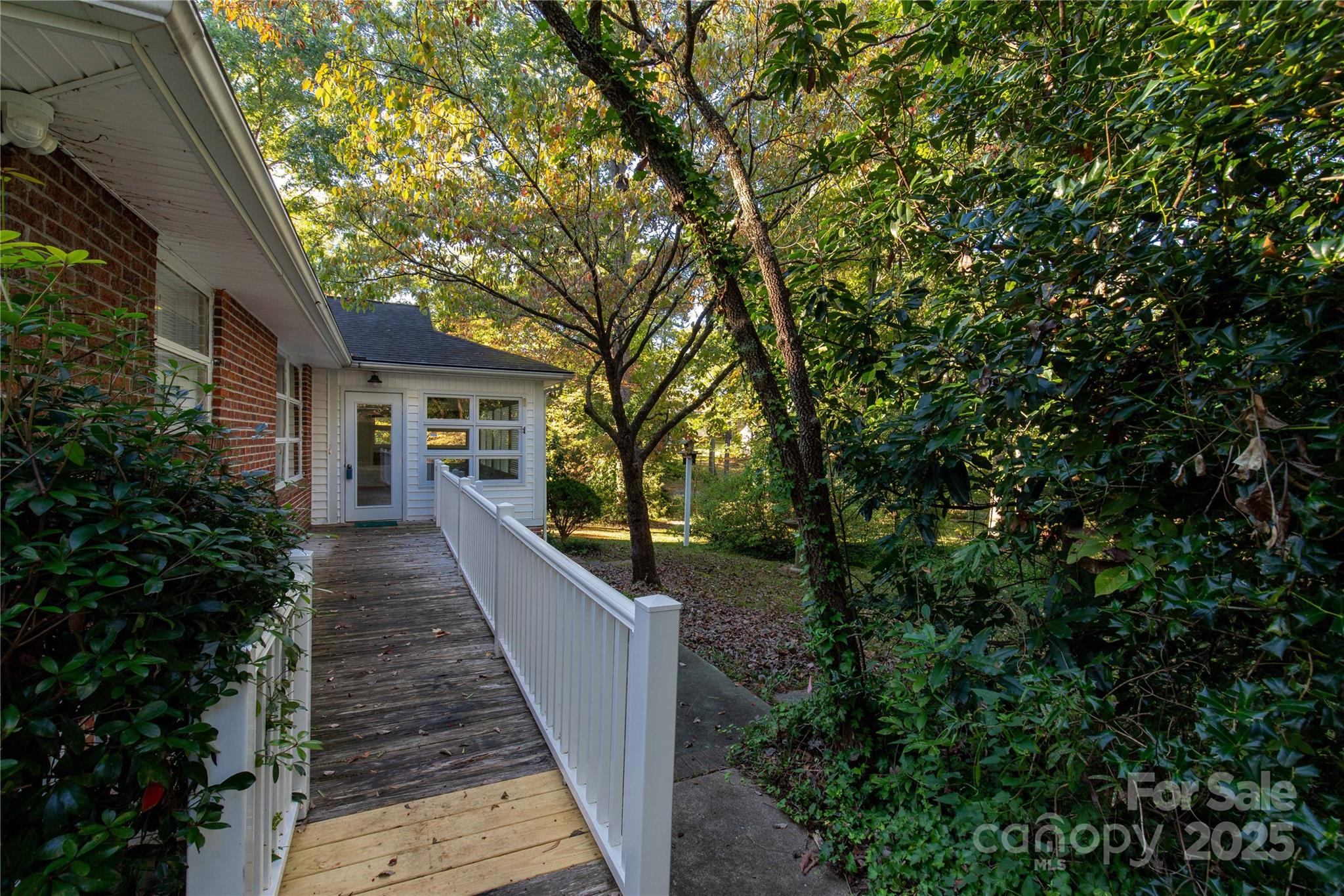 406 Pine Street Lancaster, SC 29720 - Photo 1 of 31 a view of a house with balcony