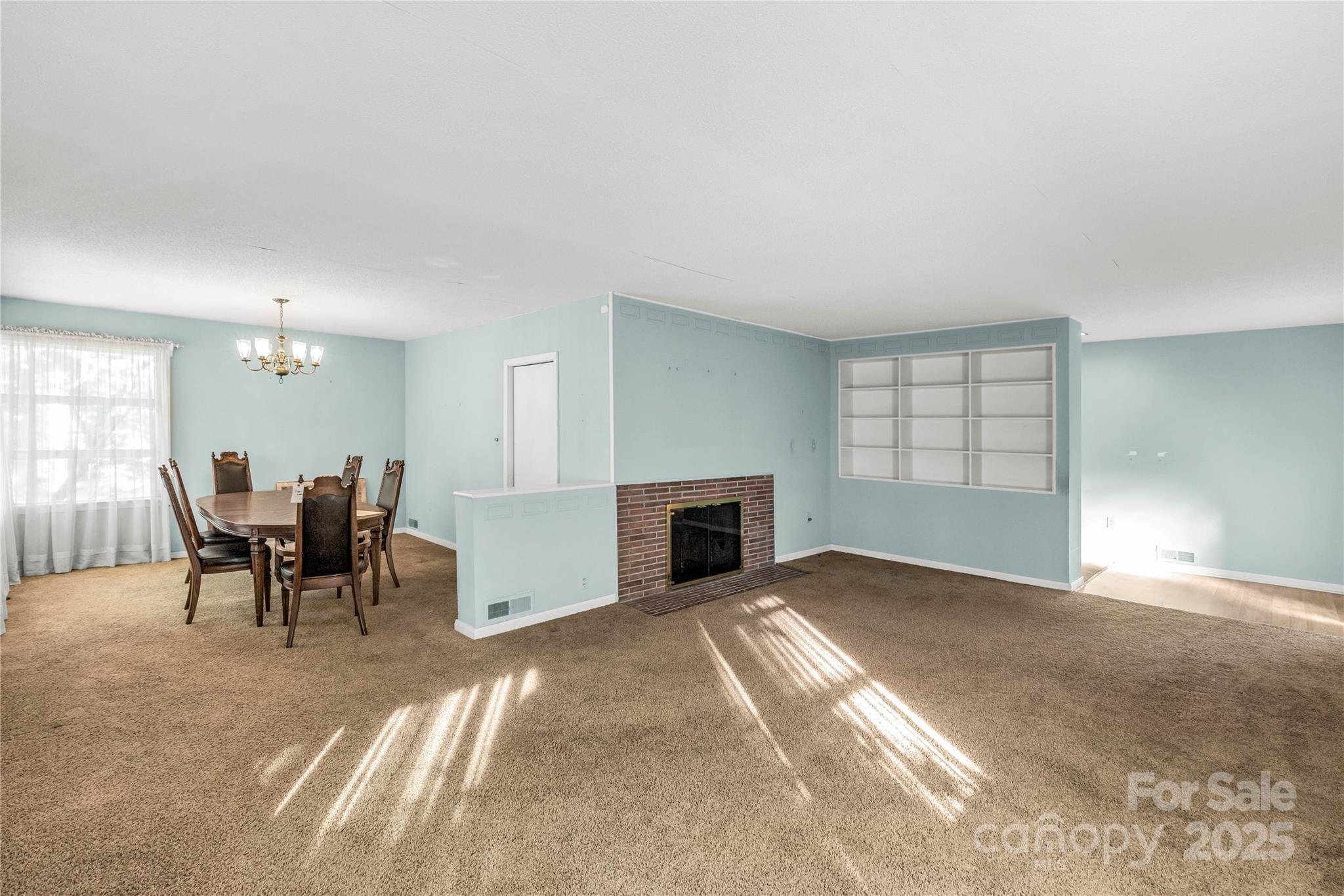 406 Pine Street Lancaster, SC 29720 - Photo 12 of 31 a view of a livingroom with furniture and a fireplace