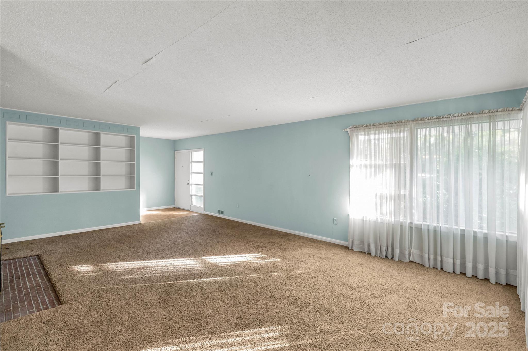 406 Pine Street Lancaster, SC 29720 - Photo 13 of 31 an empty room with windows