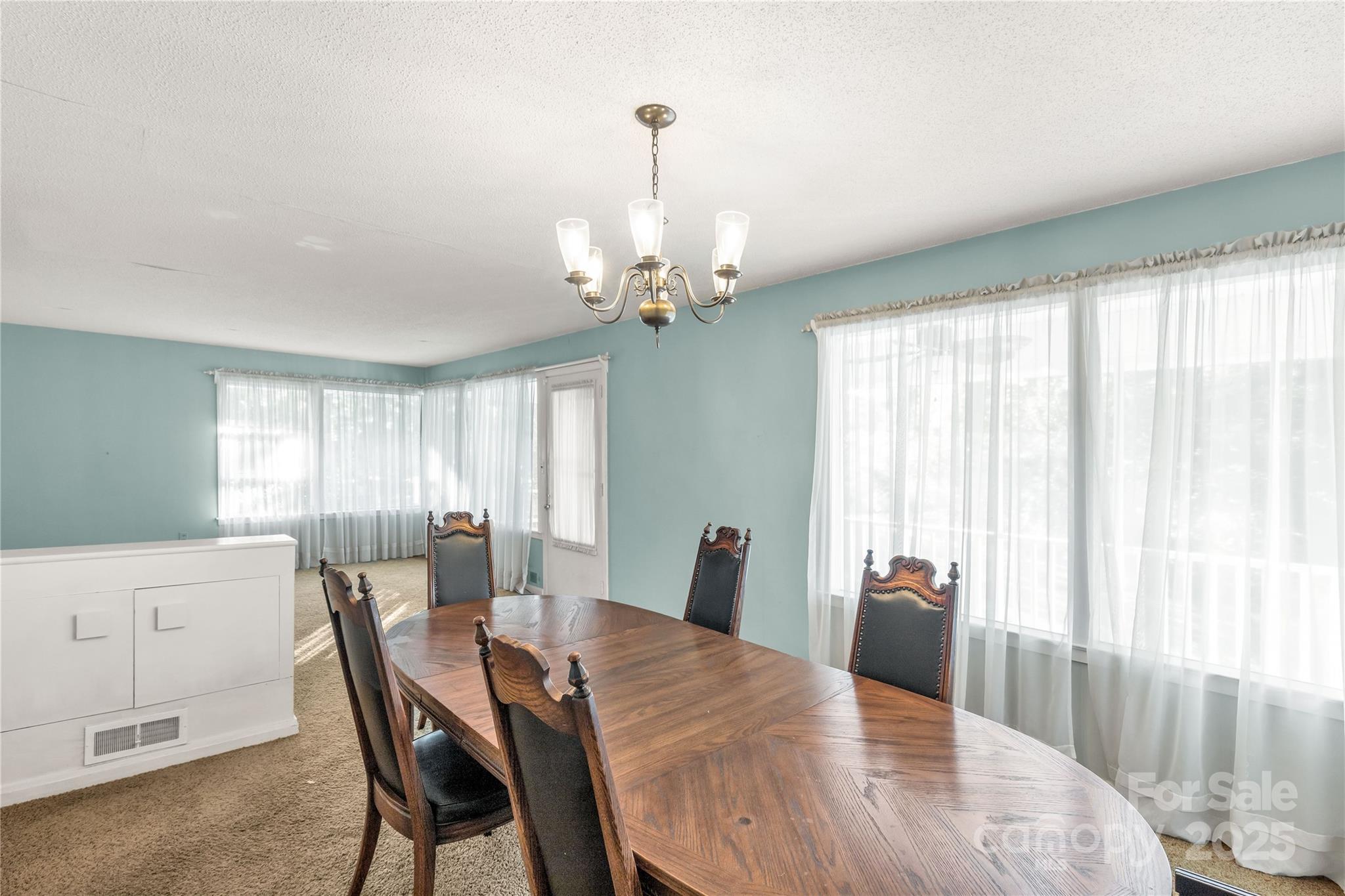 406 Pine Street Lancaster, SC 29720 - Photo 14 of 31 a view of a dining room with furniture and window