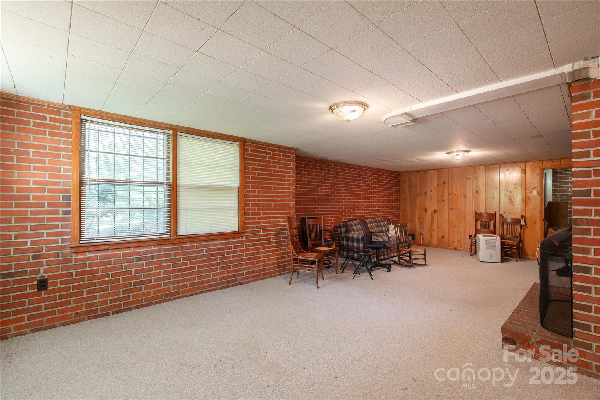 406 Pine Street Lancaster, SC 29720 - Photo 25 of 31 a lobby with furniture and two windows