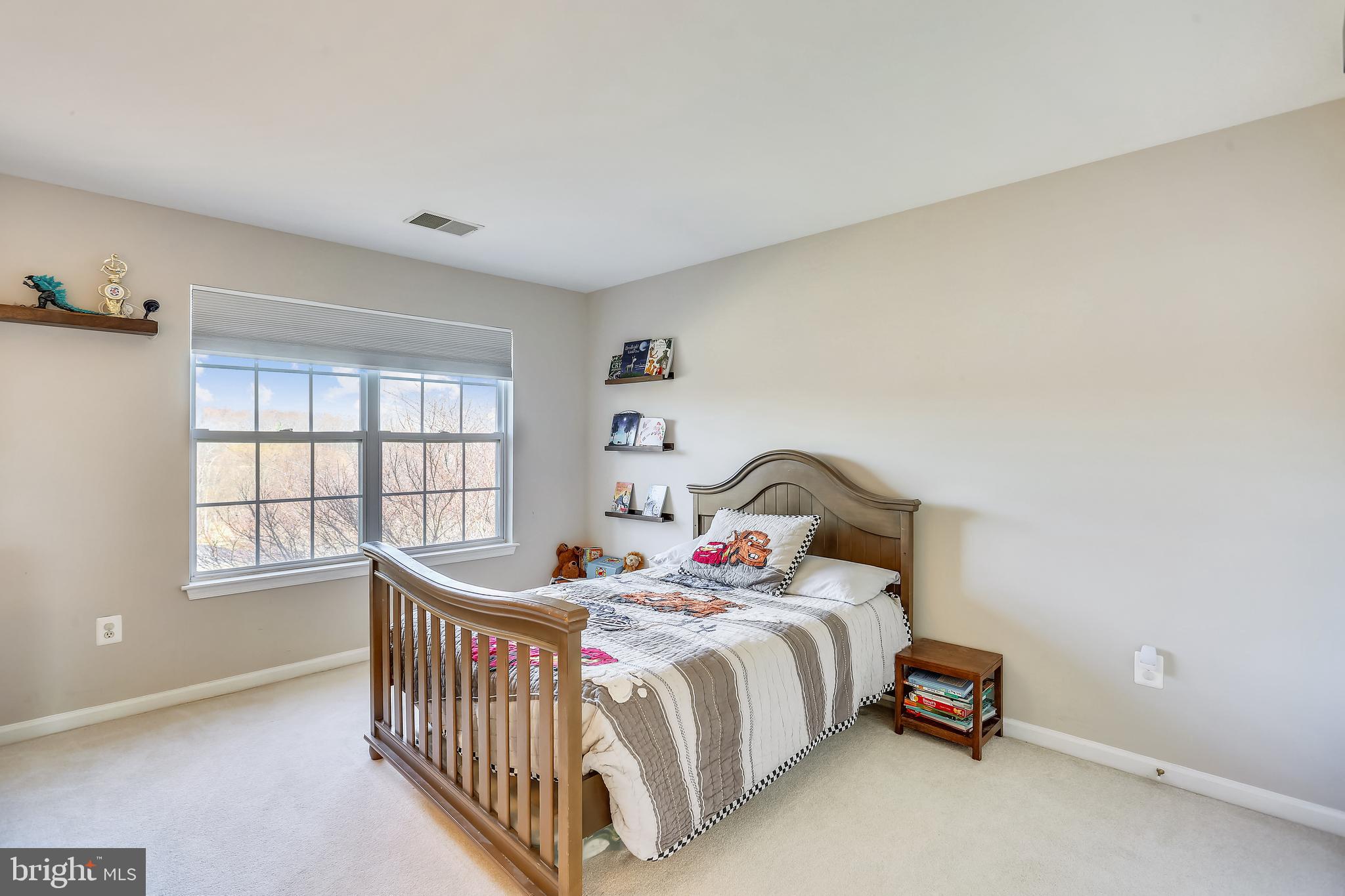 9517 Greenel Road Damascus, MD 20872 - Photo 63 of 98 a bedroom with a bed and a window
