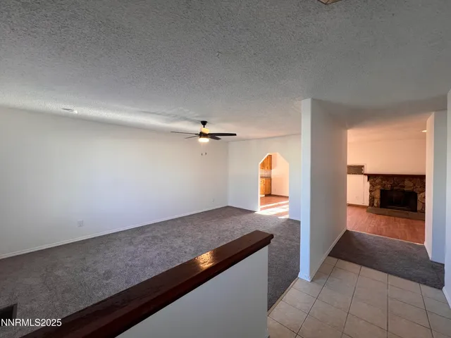 a view of a kitchen from the hallway